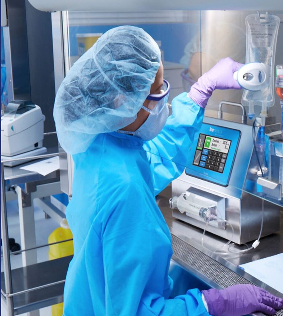 Command Medical employee working in full cleanroom PPE